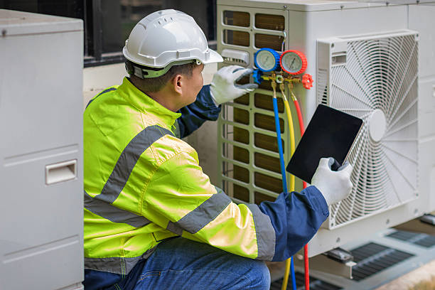 Professional Heat Pump Repair technician working in Hockessin, DE